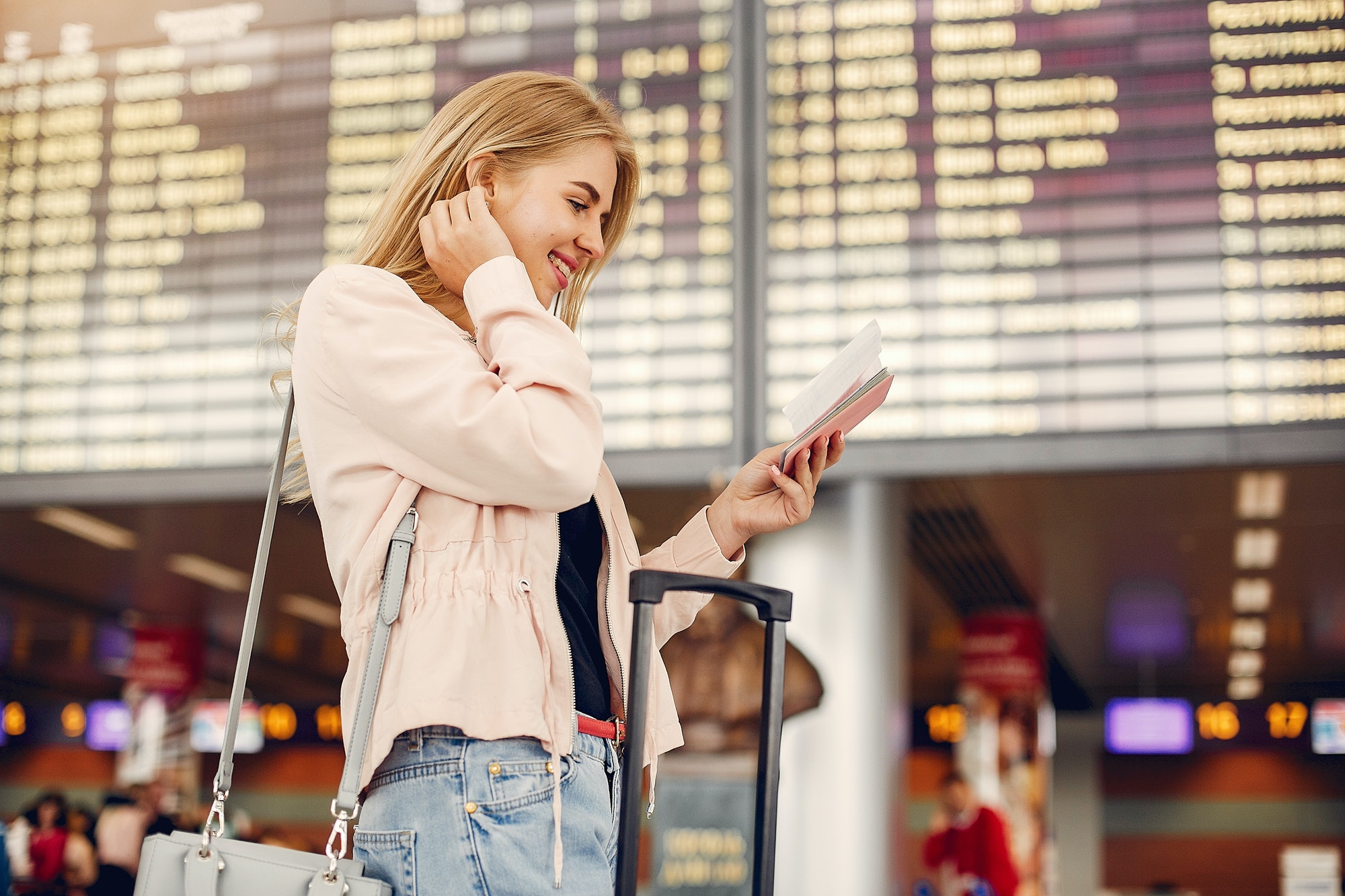 Beautiful girl standing in a airport